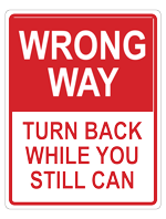 A rectangular red and white sign in the style of Wrong Way with the words Wrong Way Turn Back While You Still Can